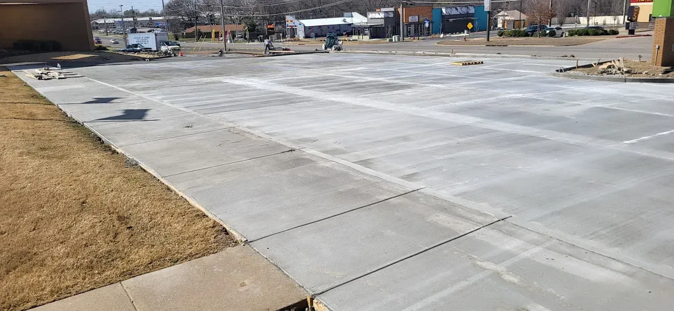Empty concrete room with pillars and unfinished walls.