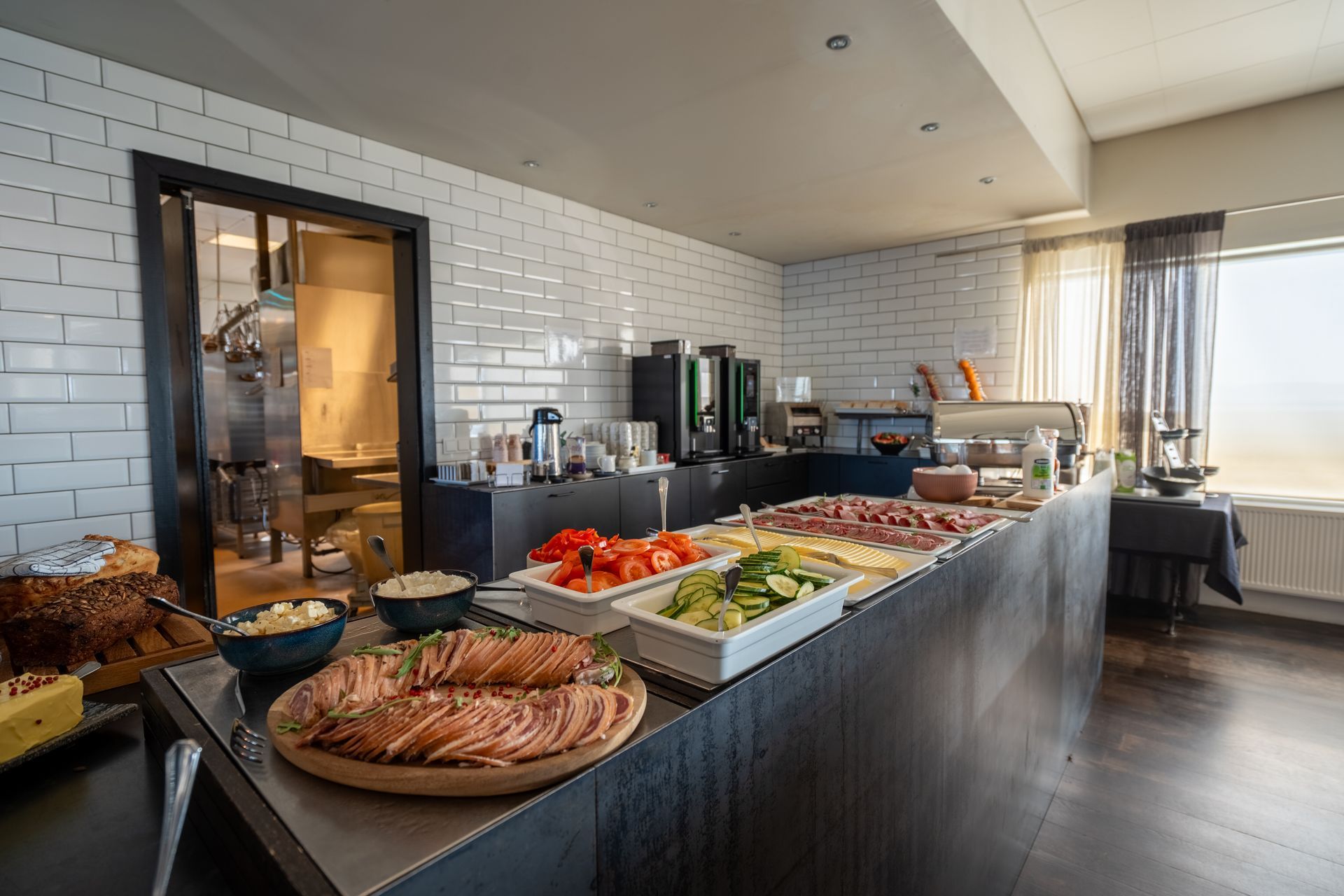 There is a buffet table with a lot of food on it.