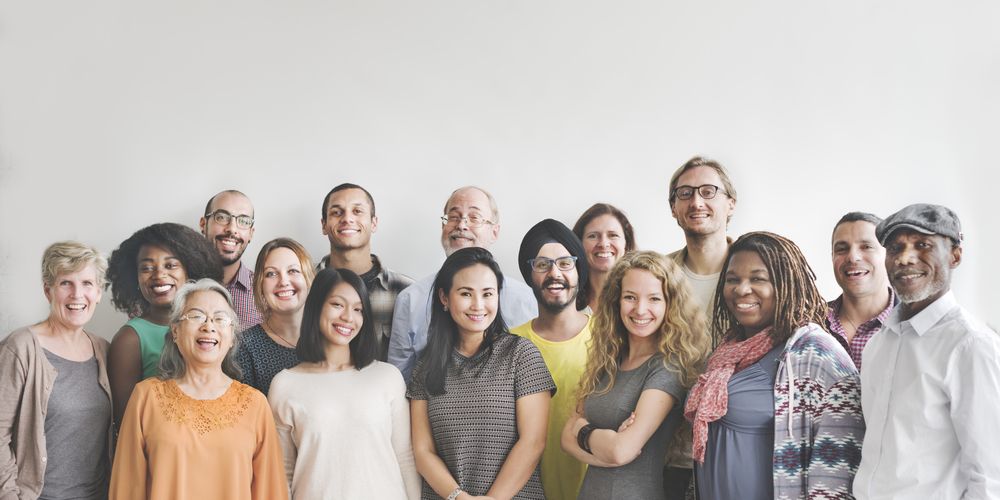 A Large Group Of People Are Posing For A Picture Together — Moreability In Southport, QLD