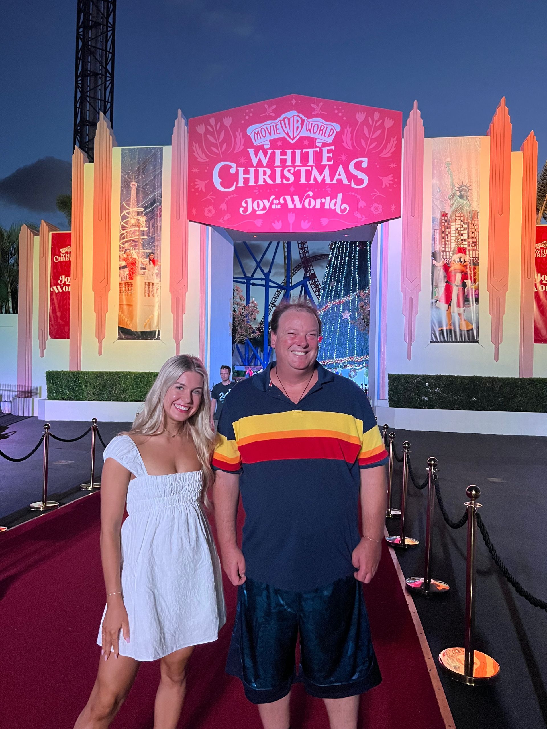 Two People In front Of A Theme Park — Move And Connect In Southport, QLD
