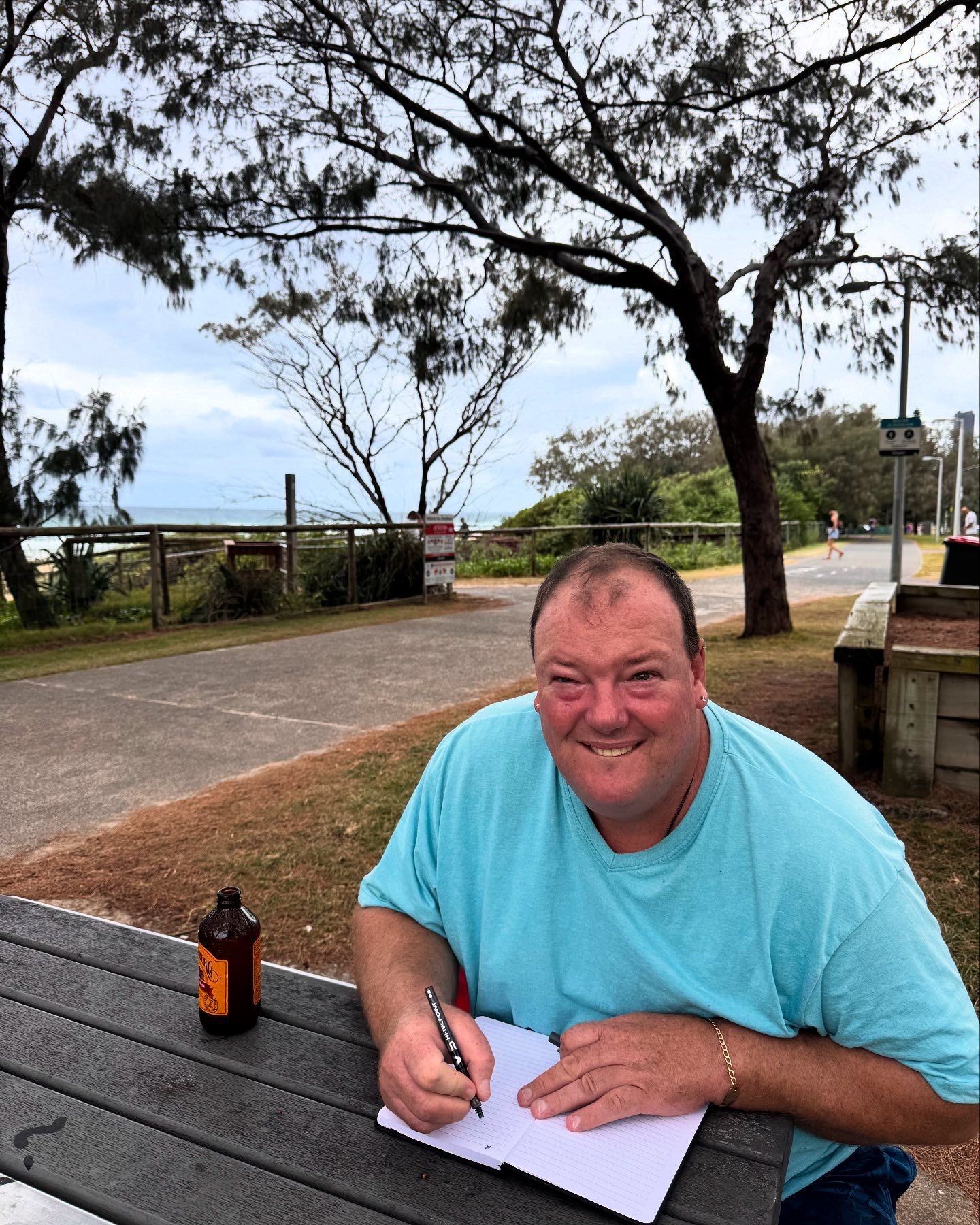 A Backpack, Hiking Boots, A Map, And A Thermos Are Sitting On Top Of A Rocky Hill — Moreability In Southport, QLD