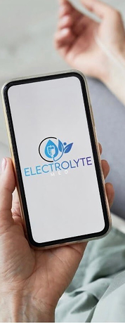 Person holding a phone displaying the 