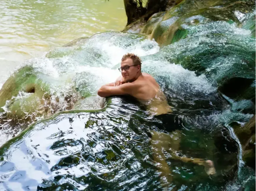 a man relaxing in the hot spring