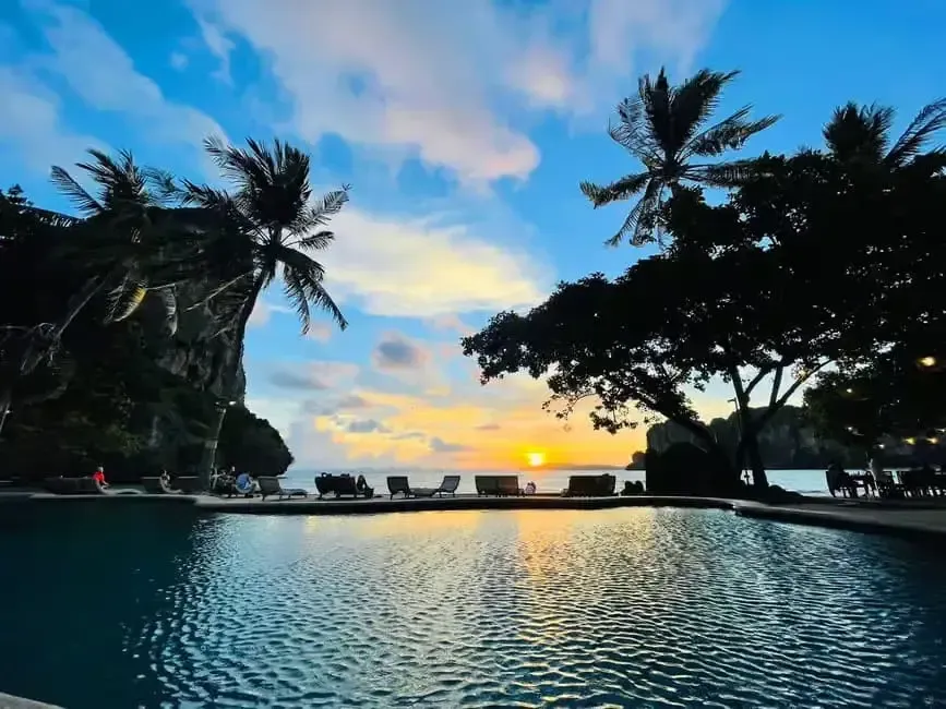 sunset on beach while in the pool