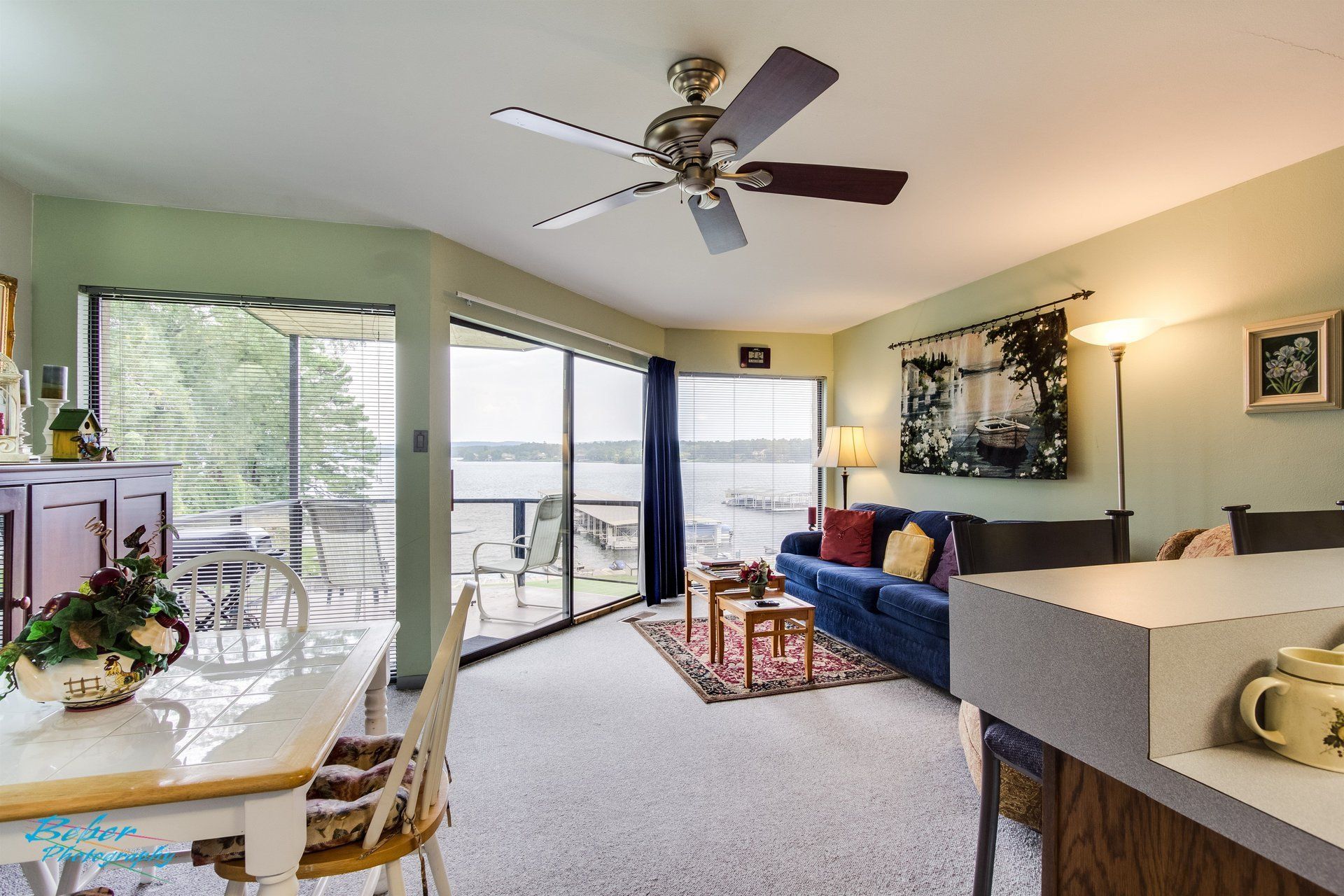 Living room with gorgeous view at Willow Beach D7