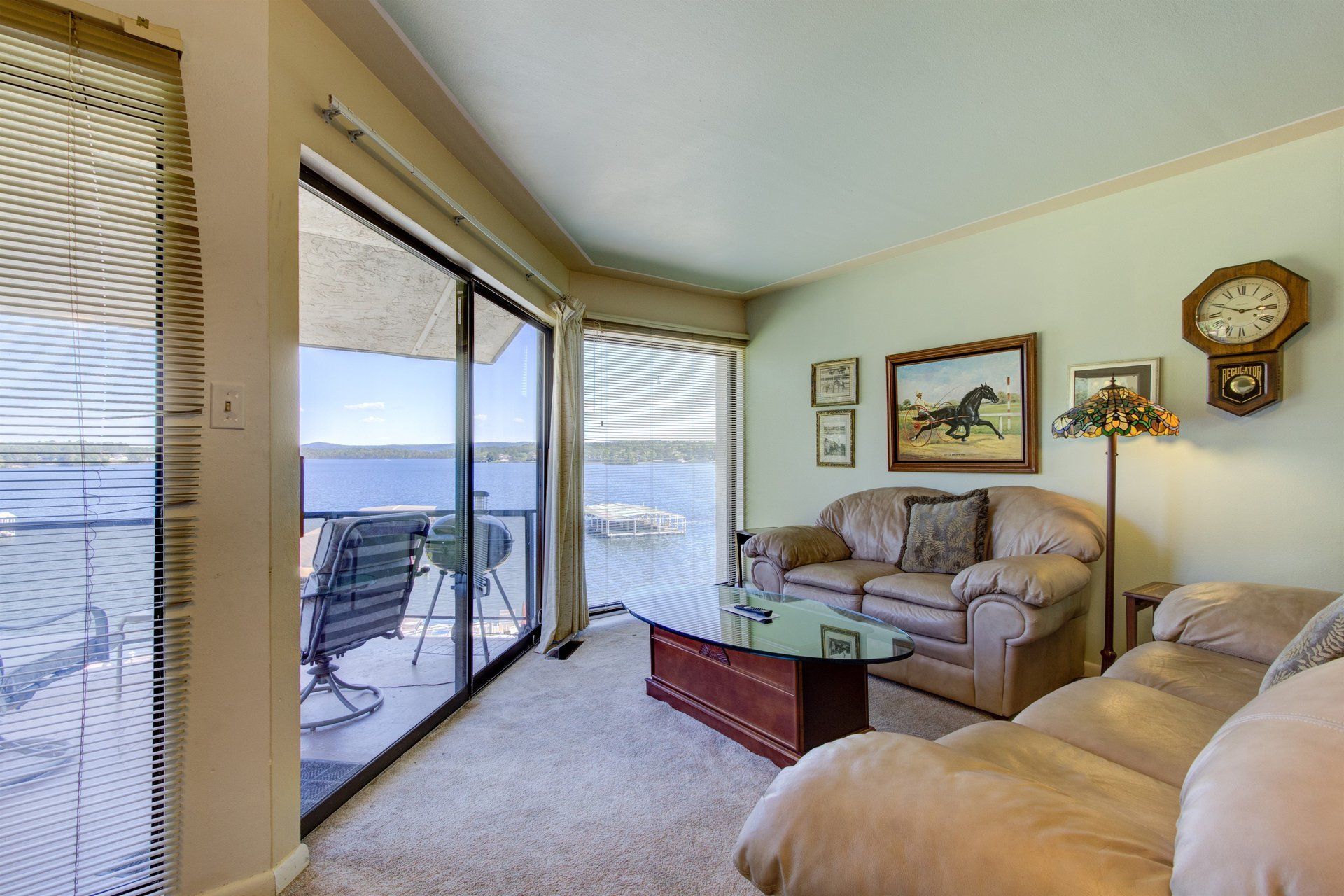Couch looking over deck with view Willow Beach B9