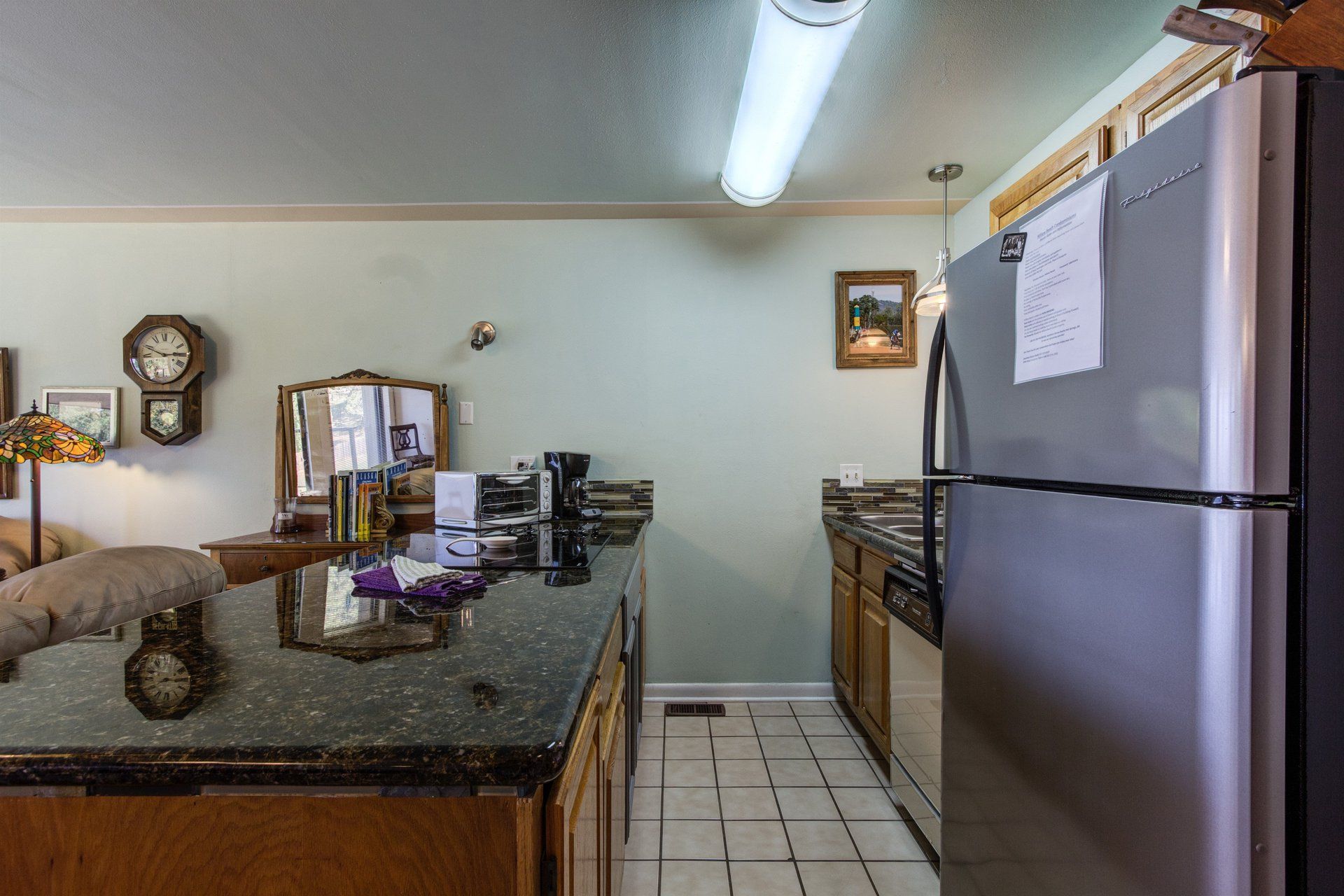 Open kitchen looking into living room at Willow Beach B9