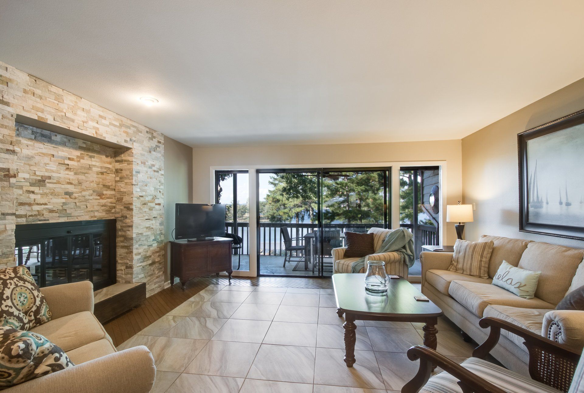 A living room filled with furniture and a fireplace