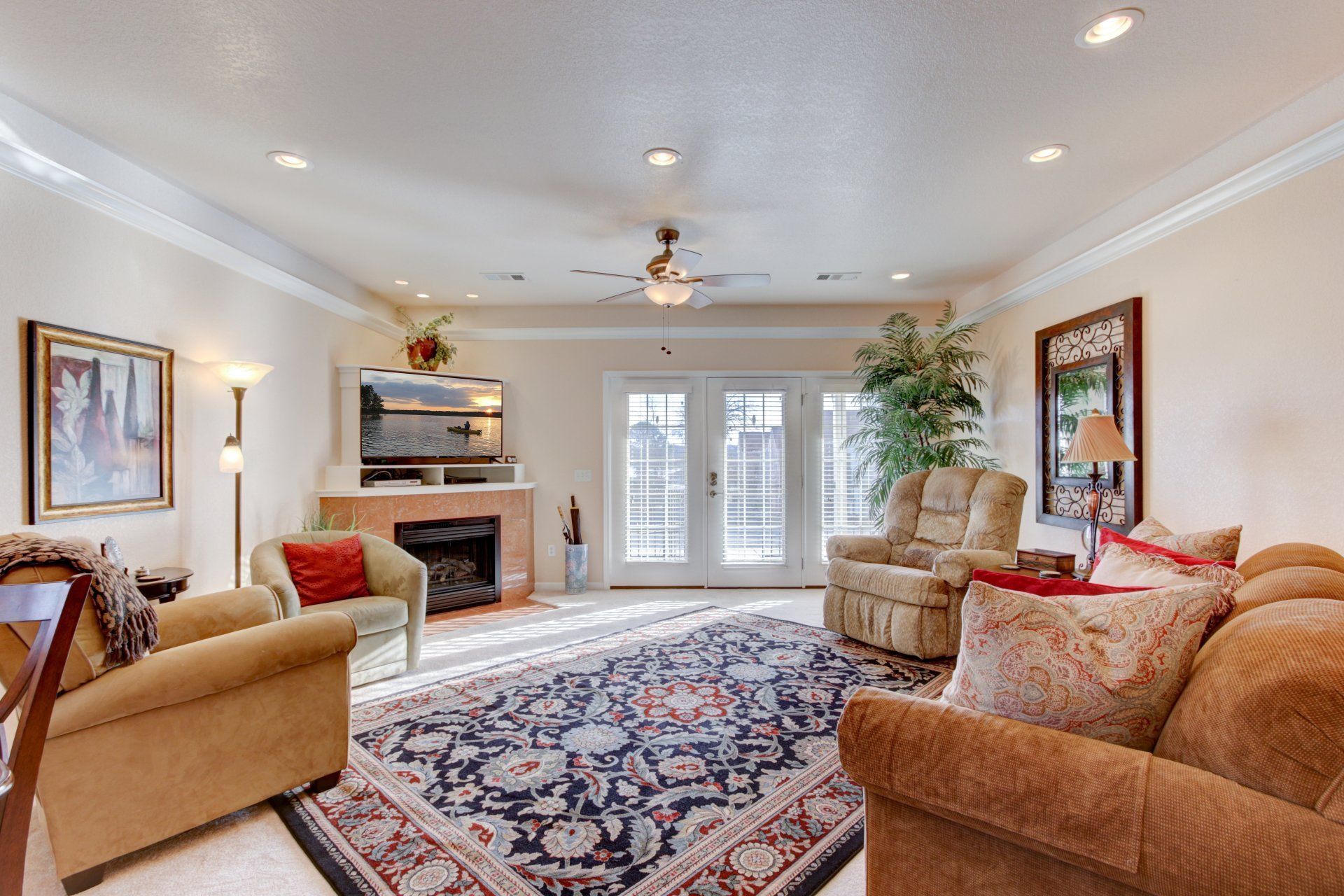 A living room filled with furniture and a fireplace