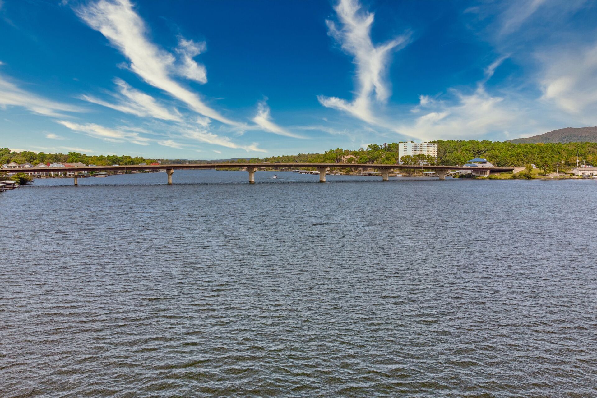 There is a bridge over a large body of water.