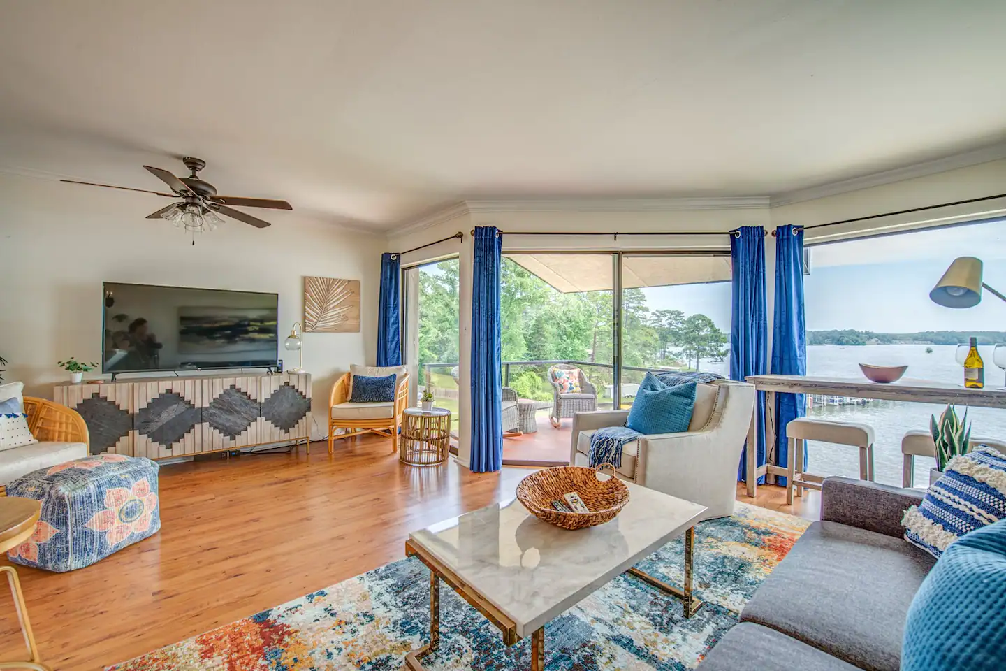 A living room filled with furniture and a flat screen tv.
