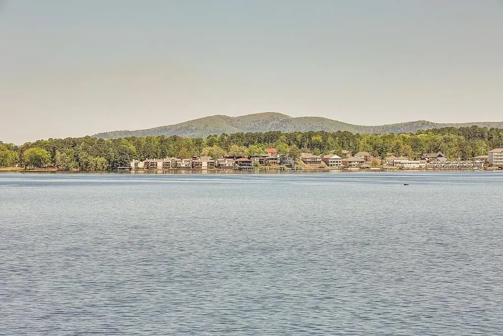A large body of water with mountains in the background.