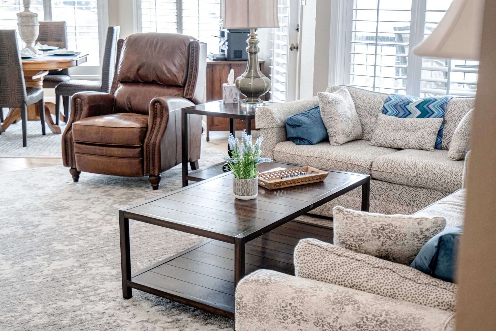 A living room filled with furniture and a coffee table.