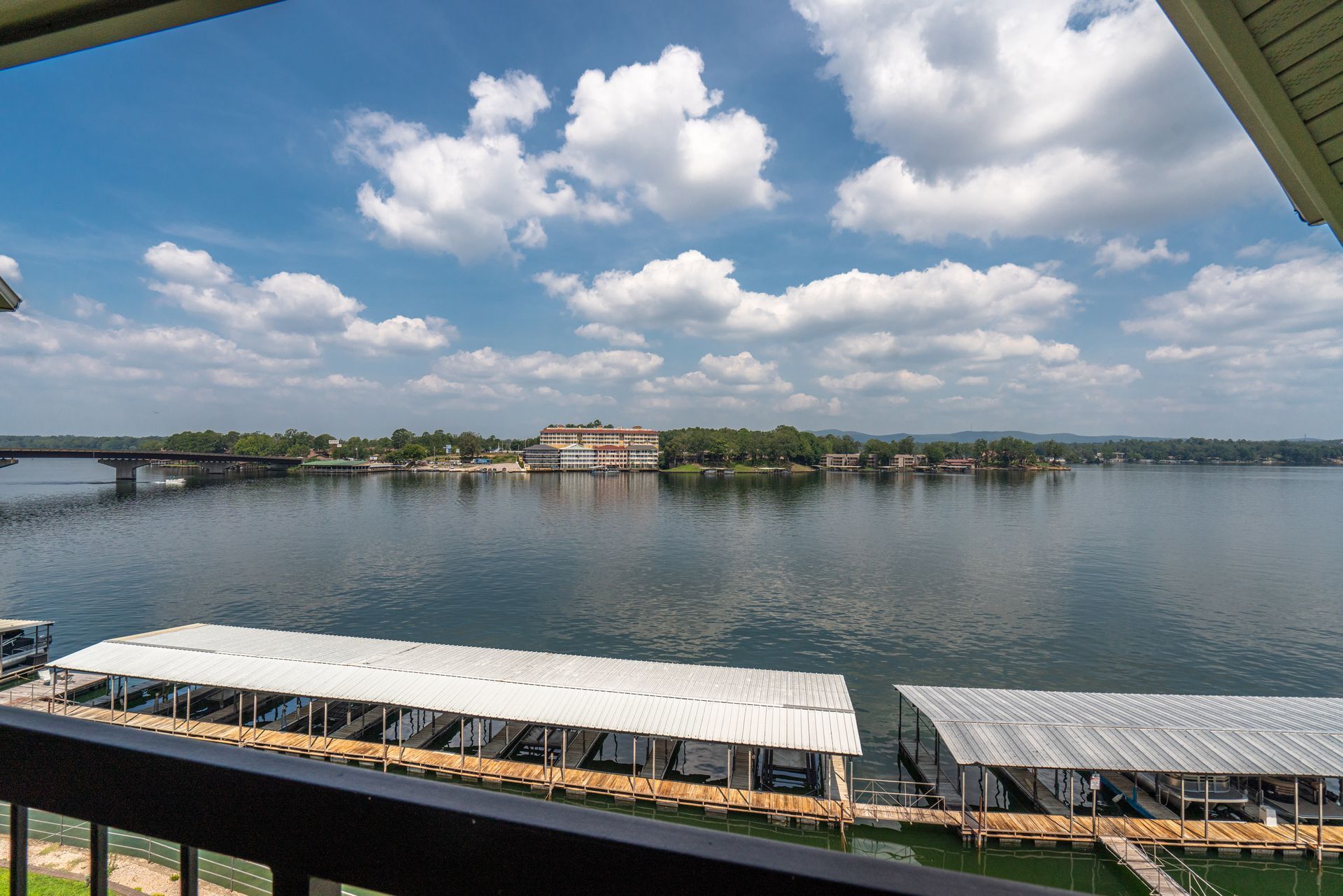 A view of a large body of water from a balcony.