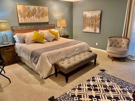 There is a large bed in the middle of the room.