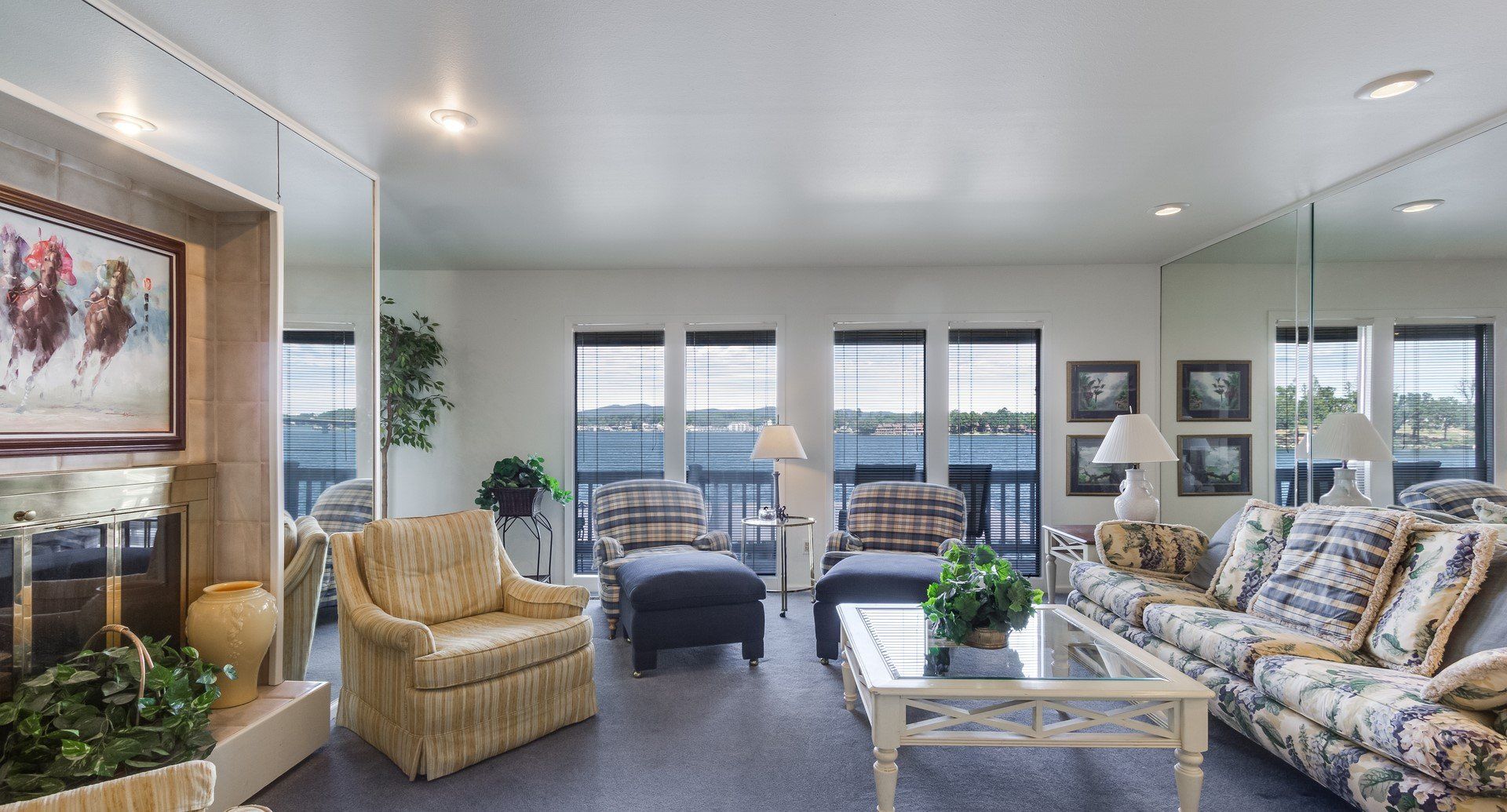 A living room with a couch a chair and a coffee table