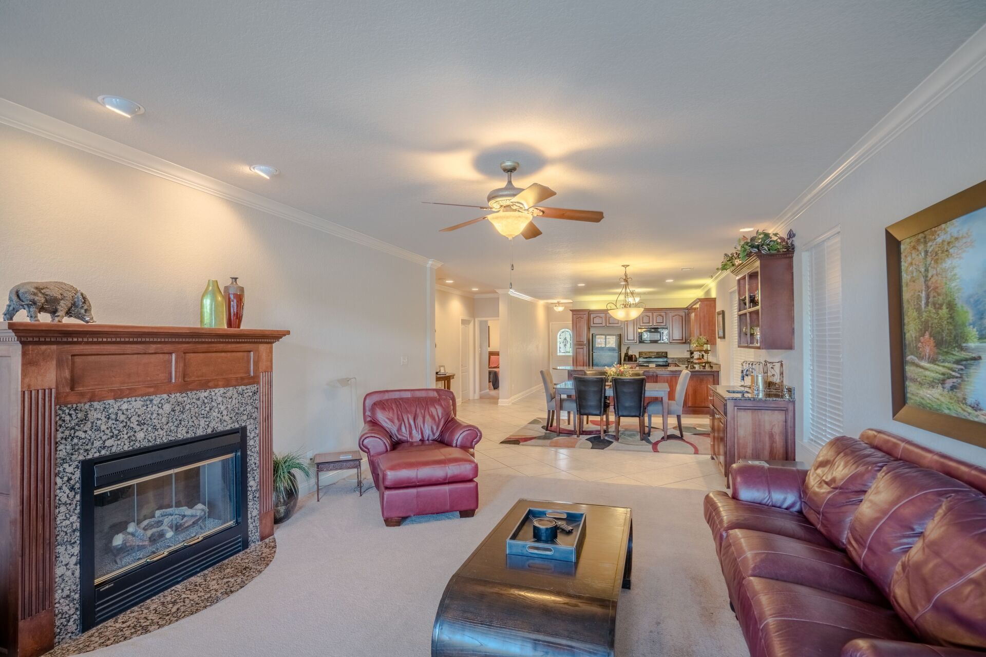A living room with a fireplace and a couch