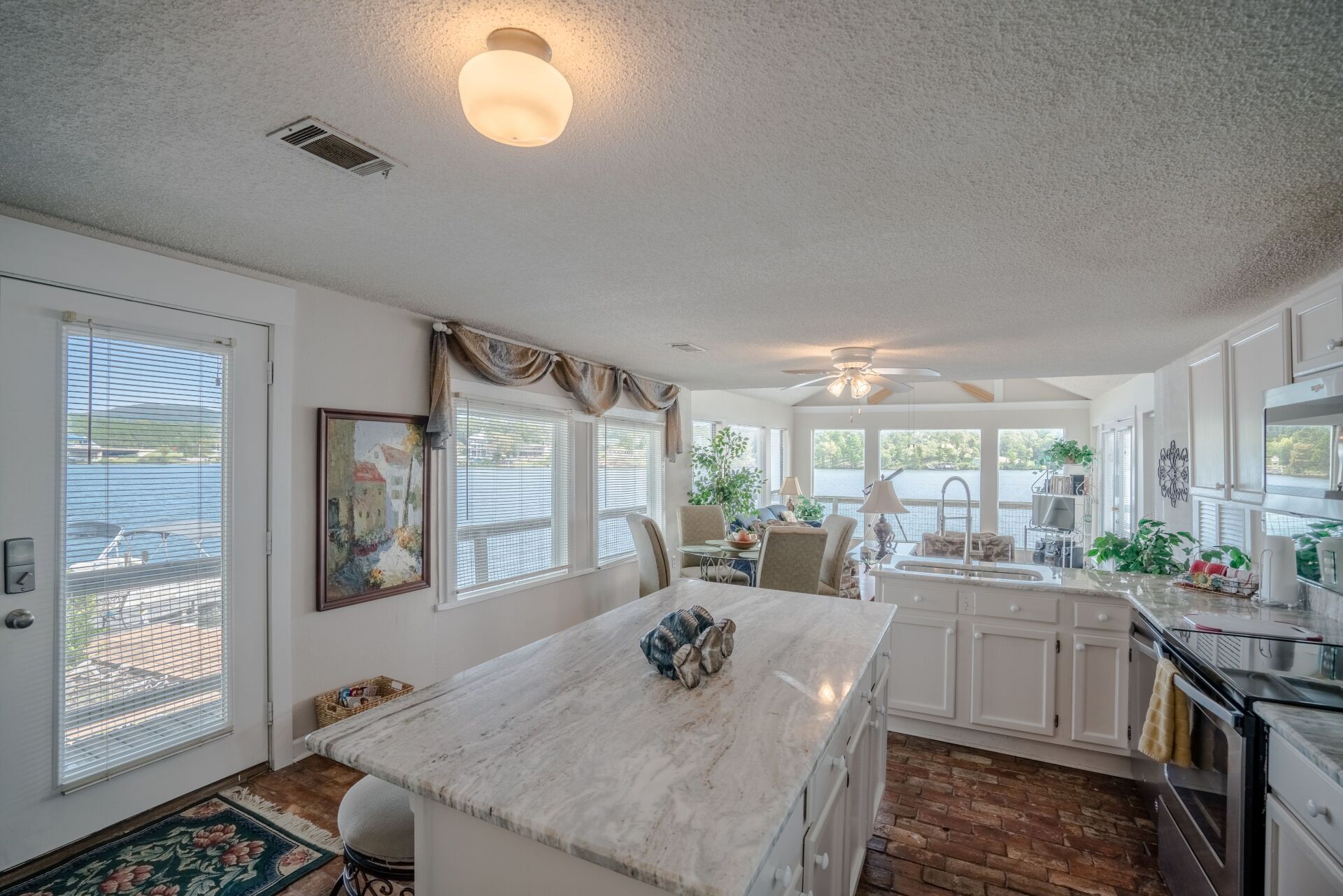 There is a large island in the middle of the kitchen.