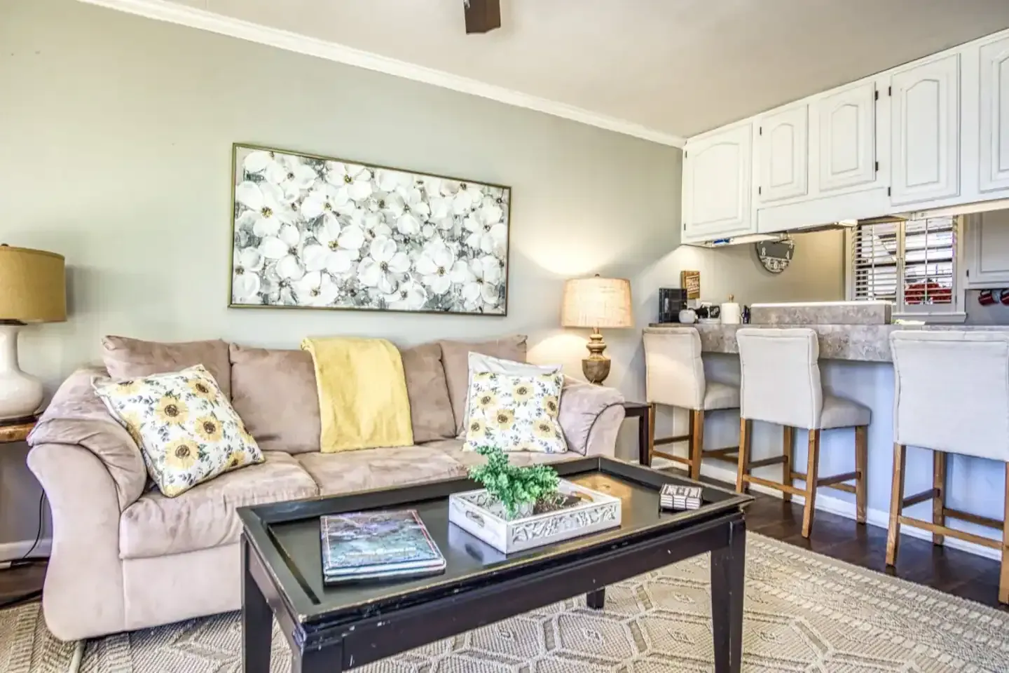A living room with a couch and a coffee table