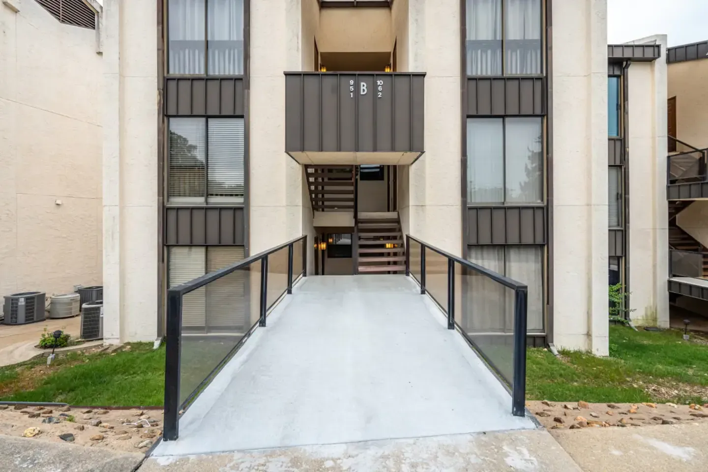 A ramp leading up to a building with stairs