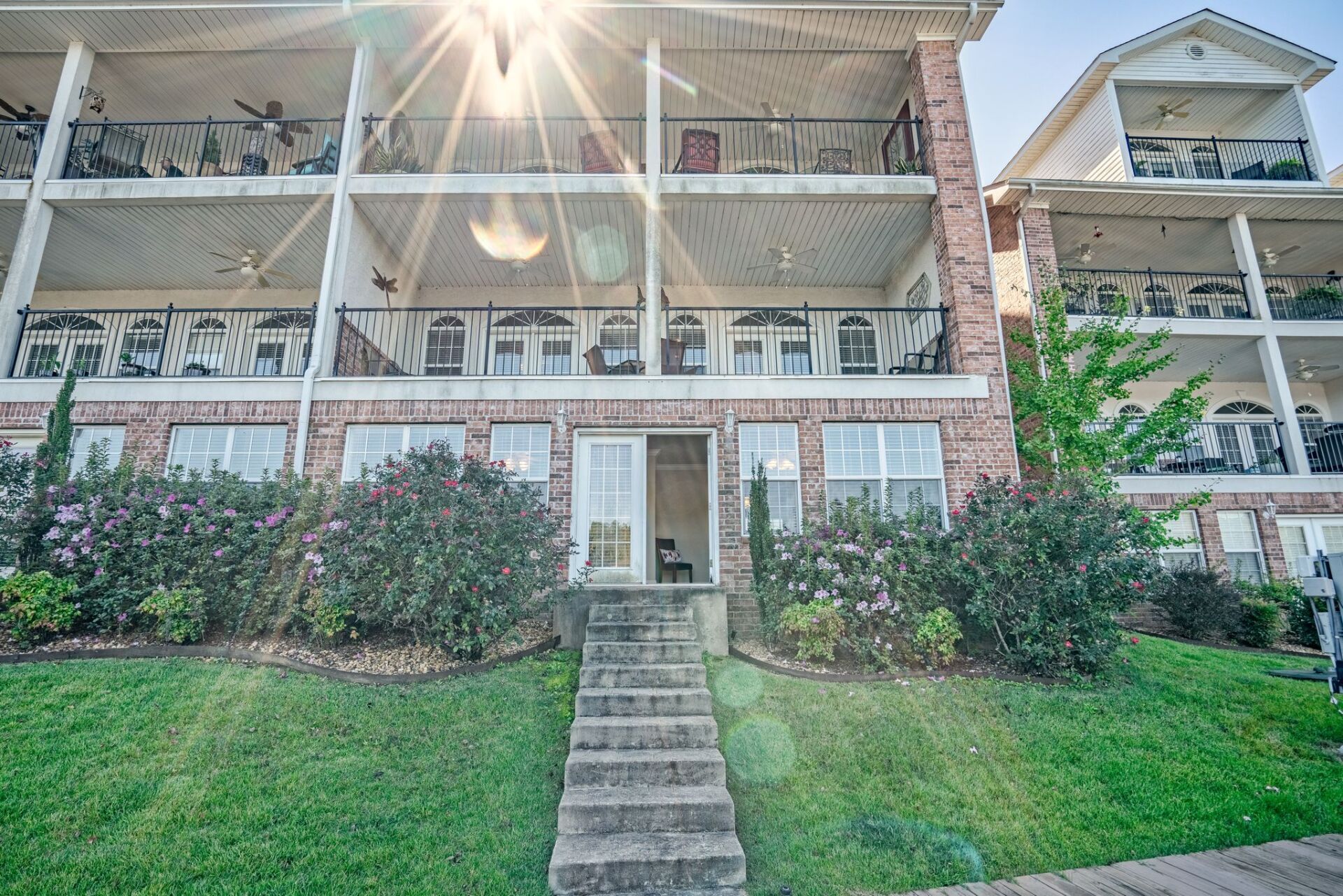 A large brick building with stairs leading up to it