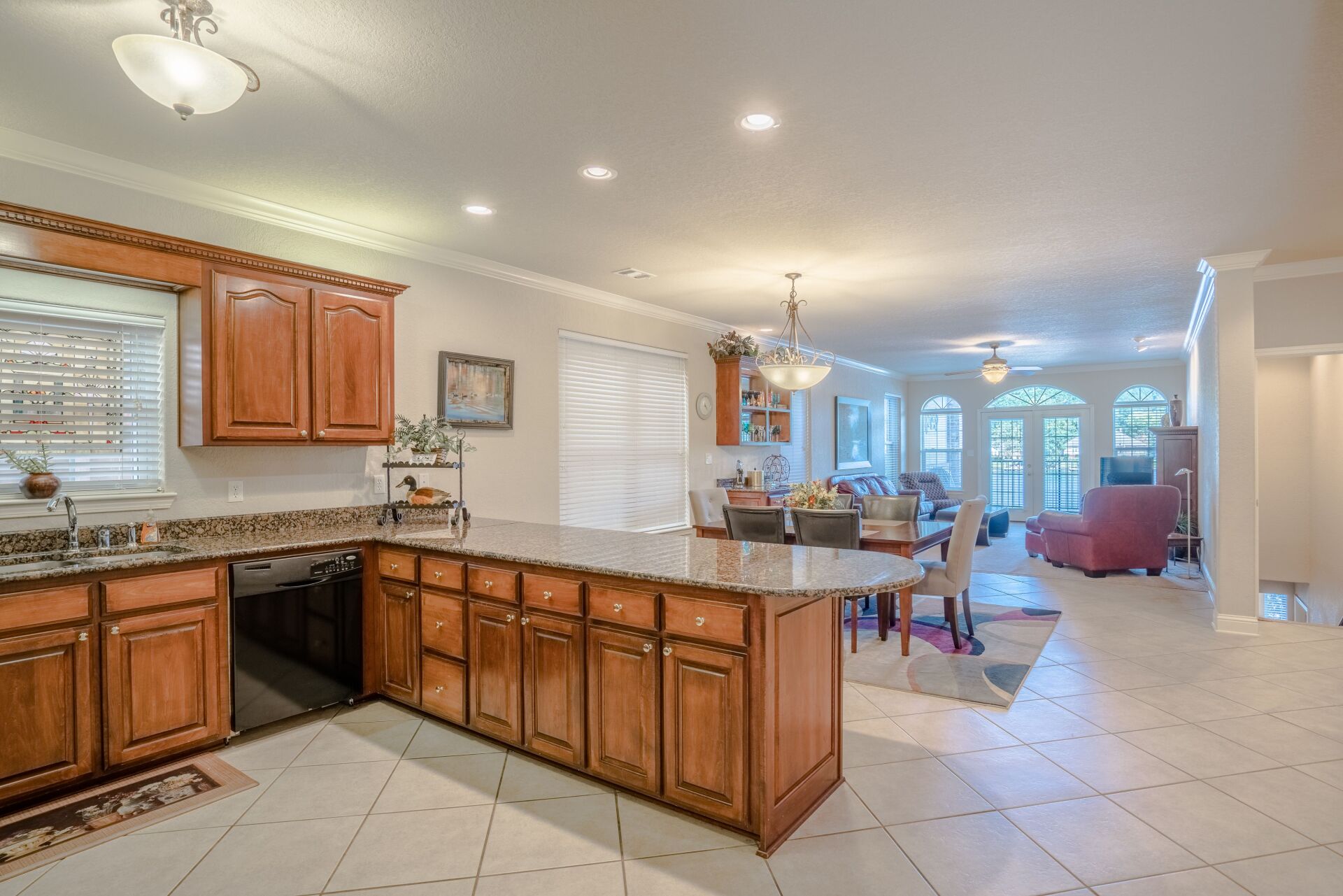 A kitchen with a large island in the middle of the room.
