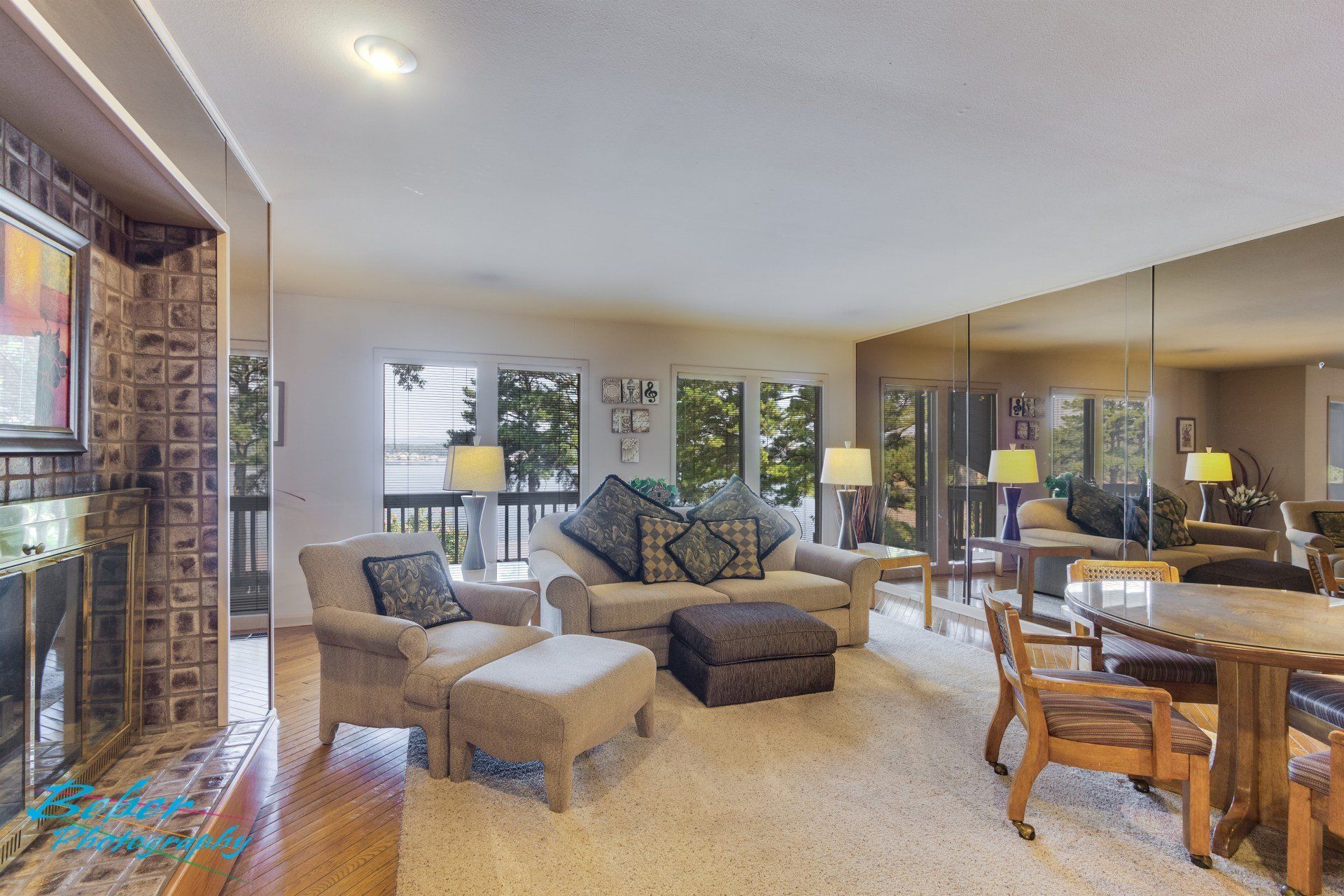 A living room filled with furniture and a fireplace