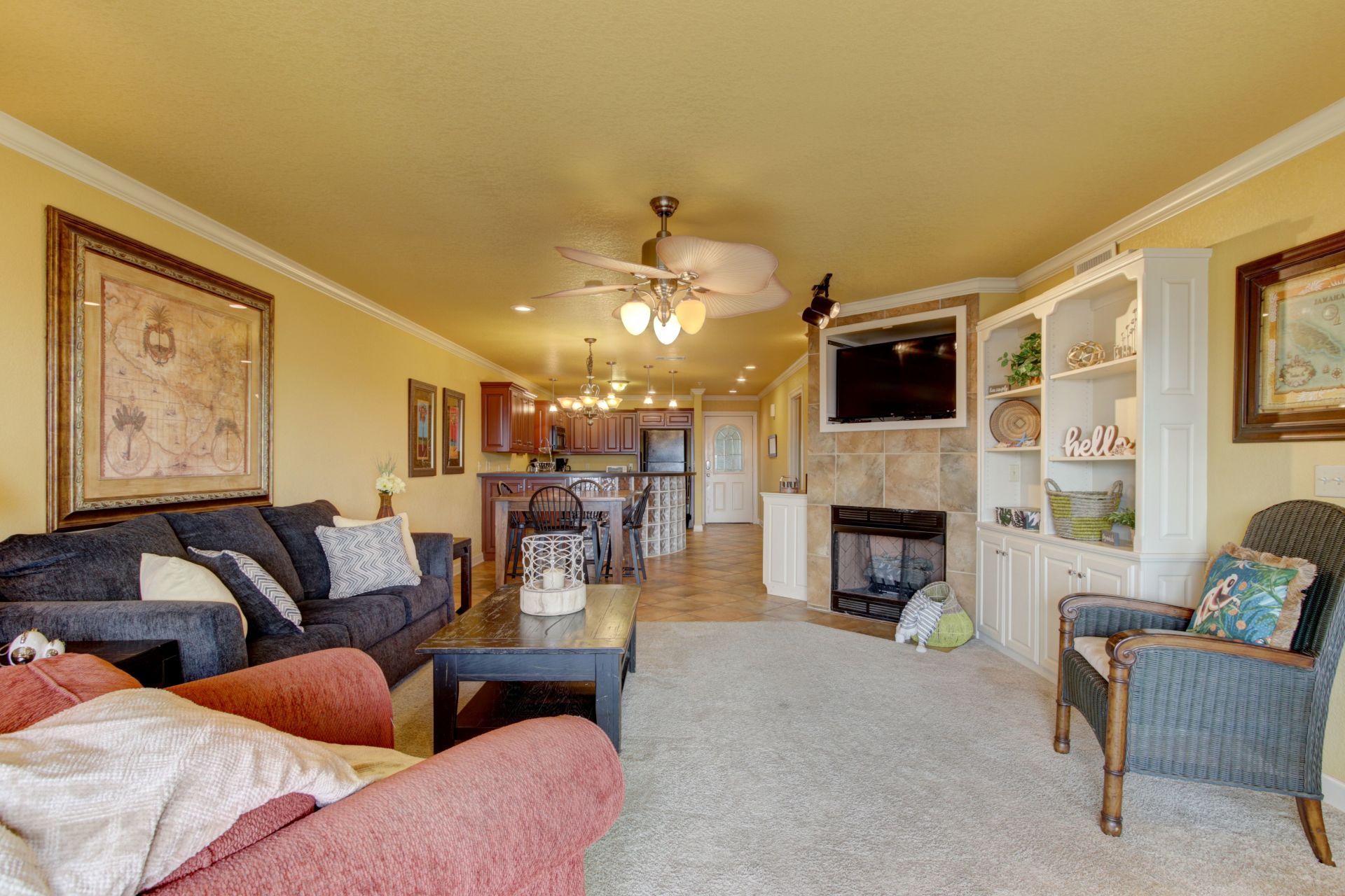 A living room filled with furniture and a fireplace.