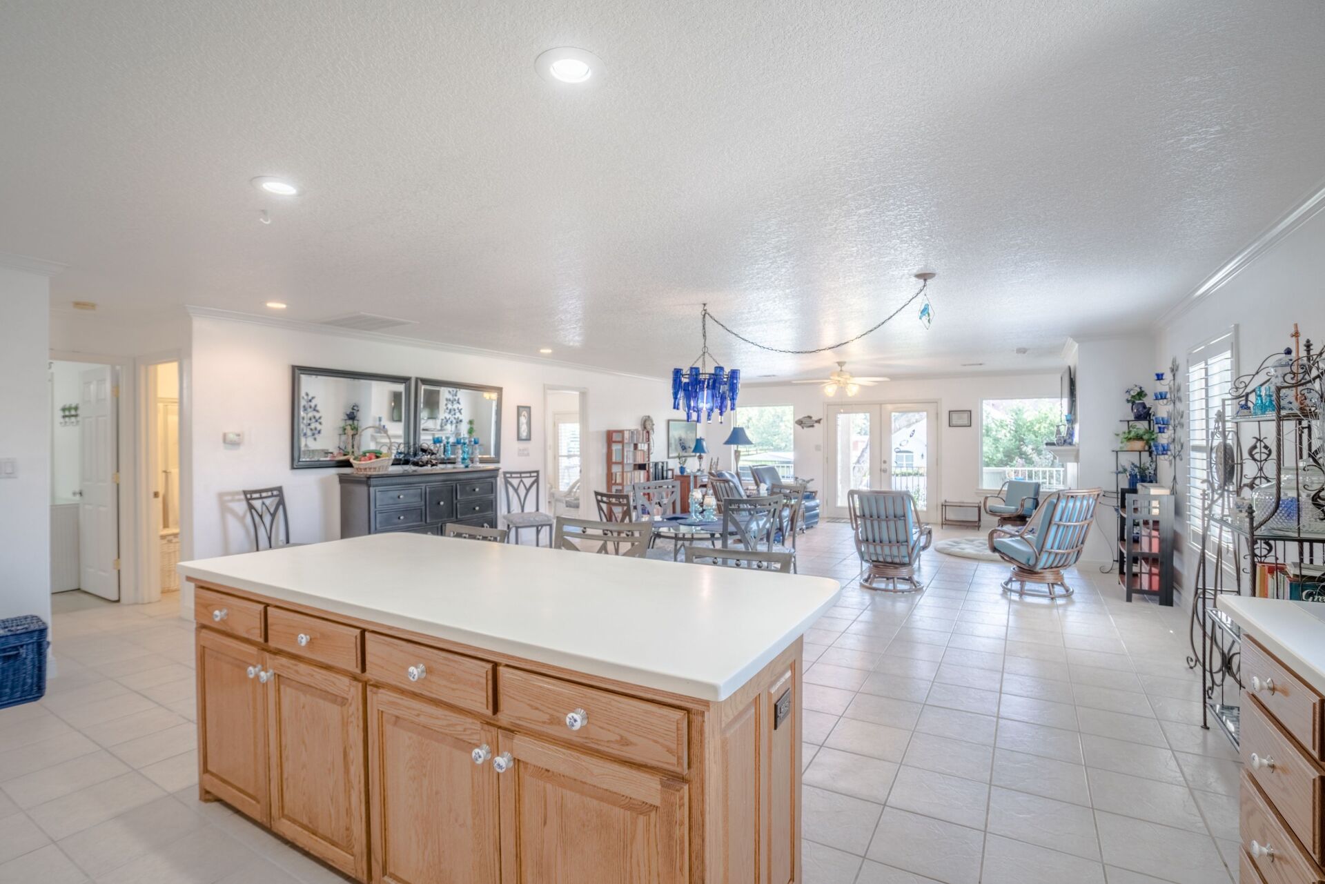A kitchen with a large island in the middle of the room.