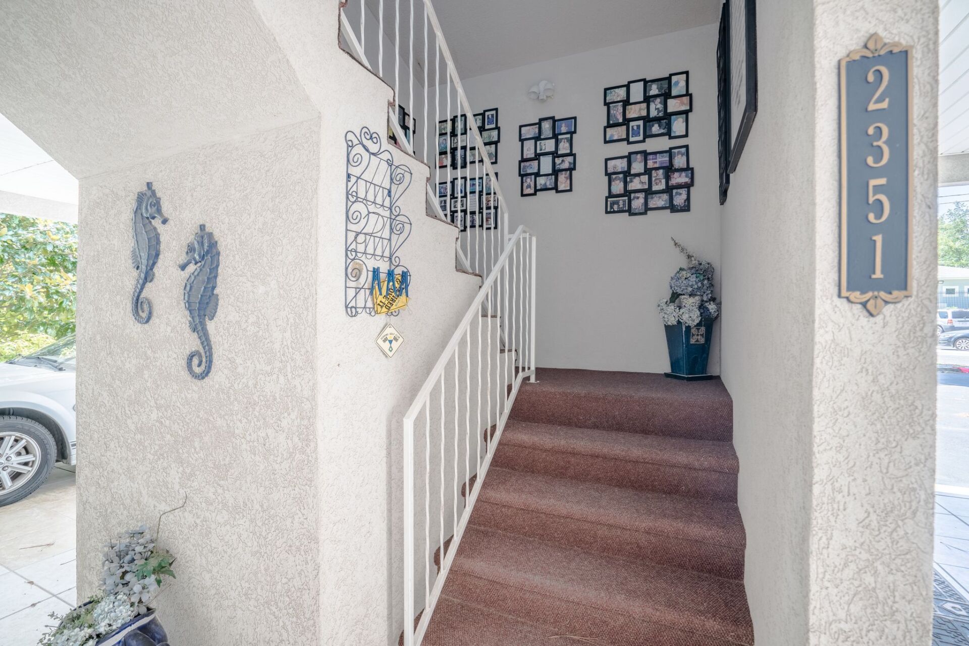 A set of stairs leading up to the second floor of a house.