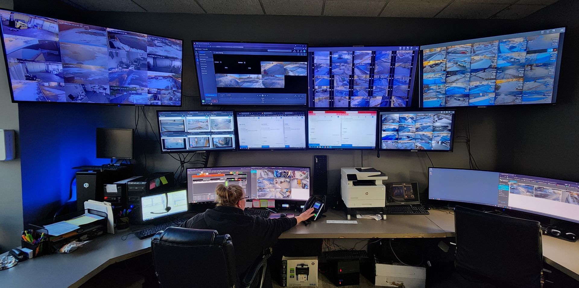 Dispatch Office with several computer screens and dispatch equipment 