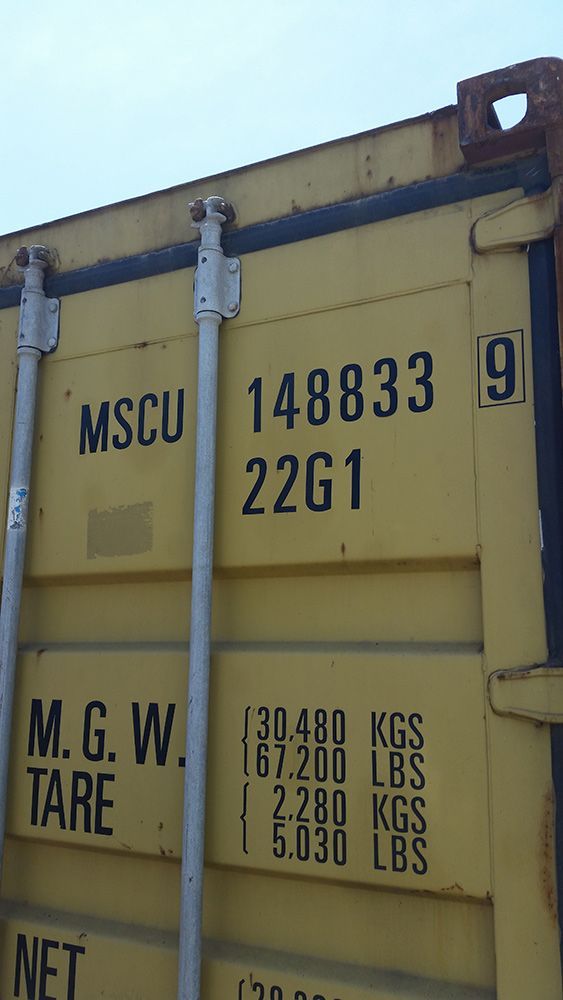 A Yellow Shipping Container Has The Number 9 On It — Oz Shipping Containers in Grafton, NSW