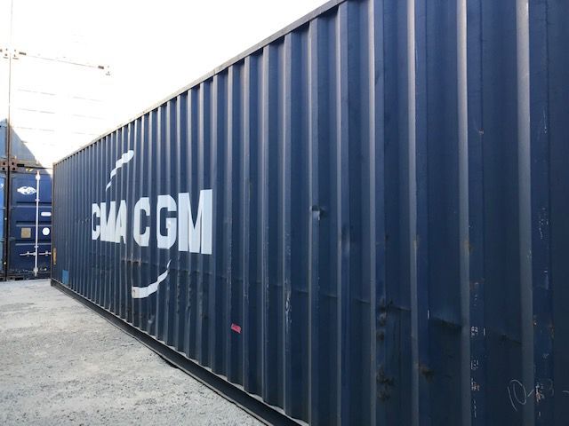 A Blue Shipping Container With The Word Cma Cgm Painted On It — Oz Shipping Containers in Teralba, NSW