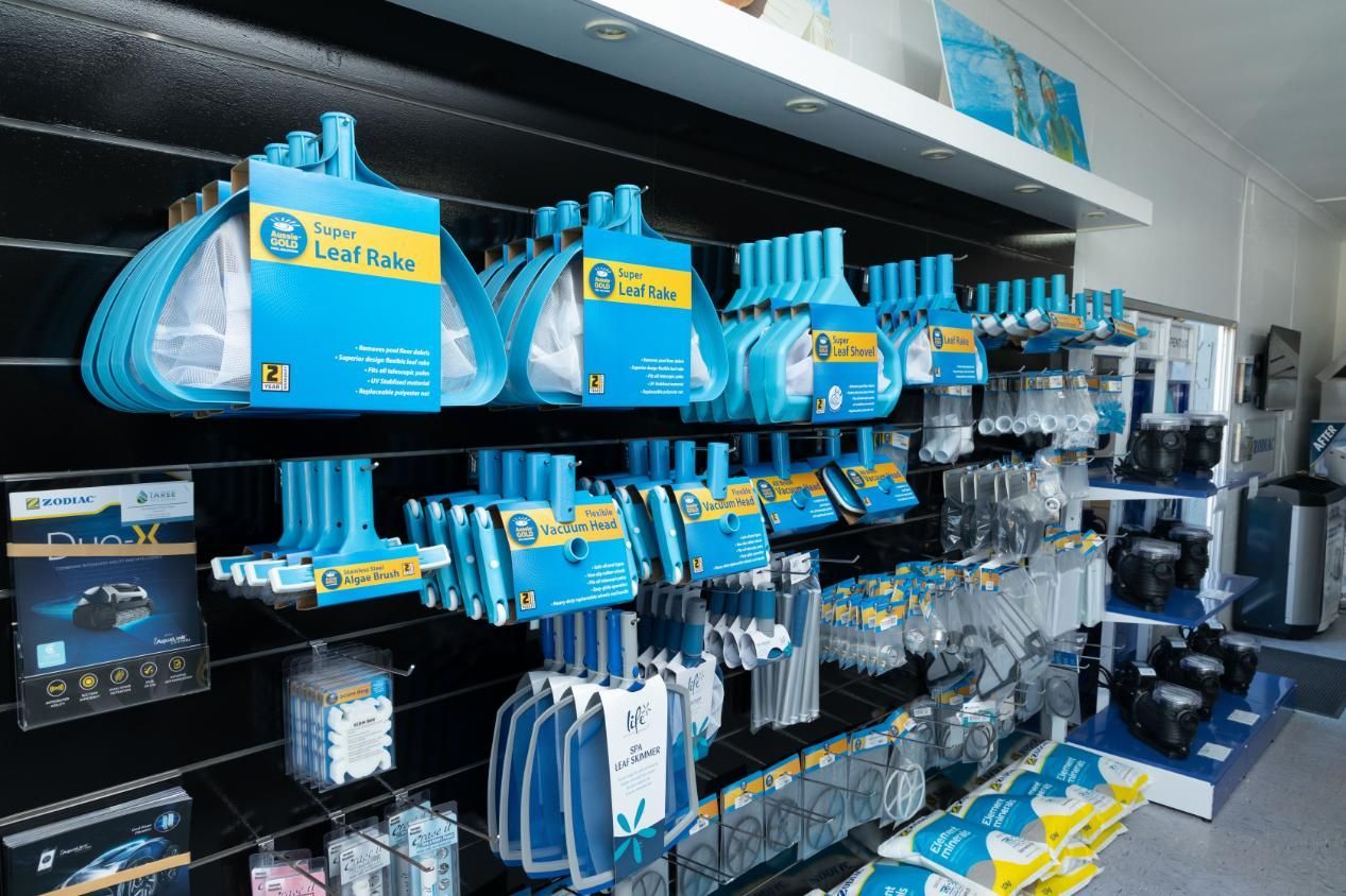 A Store Filled With Lots of Blue and White Items — Taree Pool Supplies in Taree, NSW