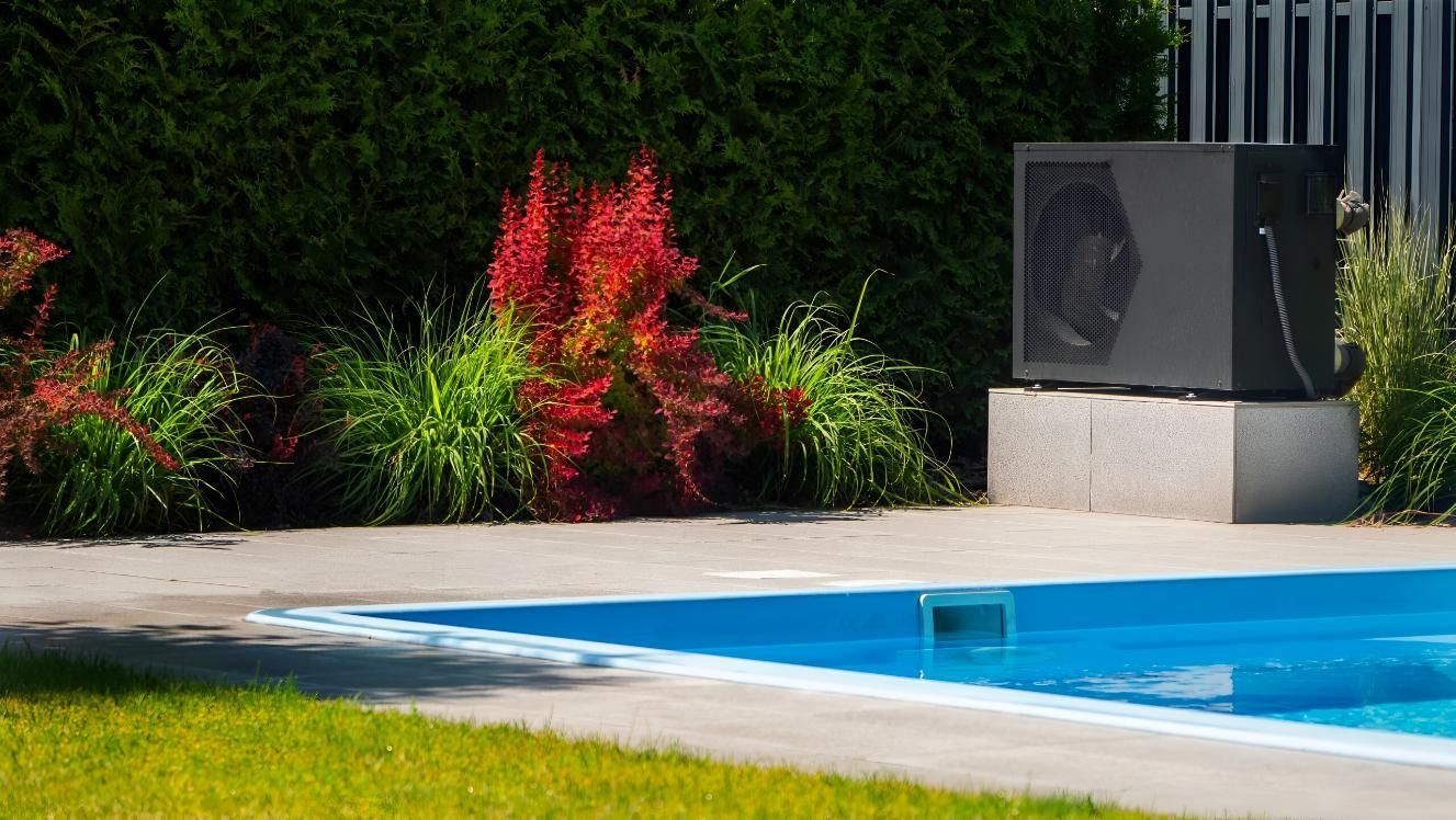 A Swimming Pool With a Heater on the Side of It — Taree Pool Supplies in Wingham, NSW