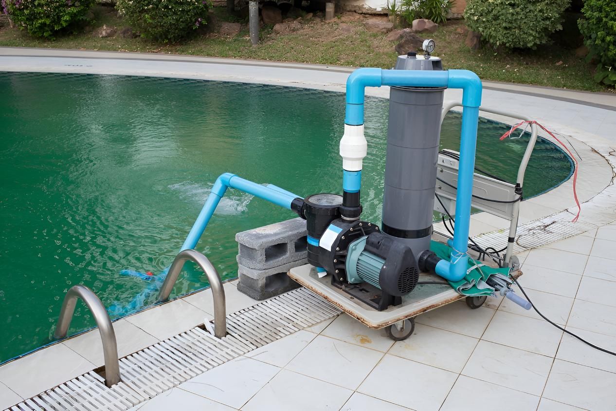 A Swimming Pool With a Pump and Filter Attached to It — Taree Pool Supplies in Smiths Lake, NSW