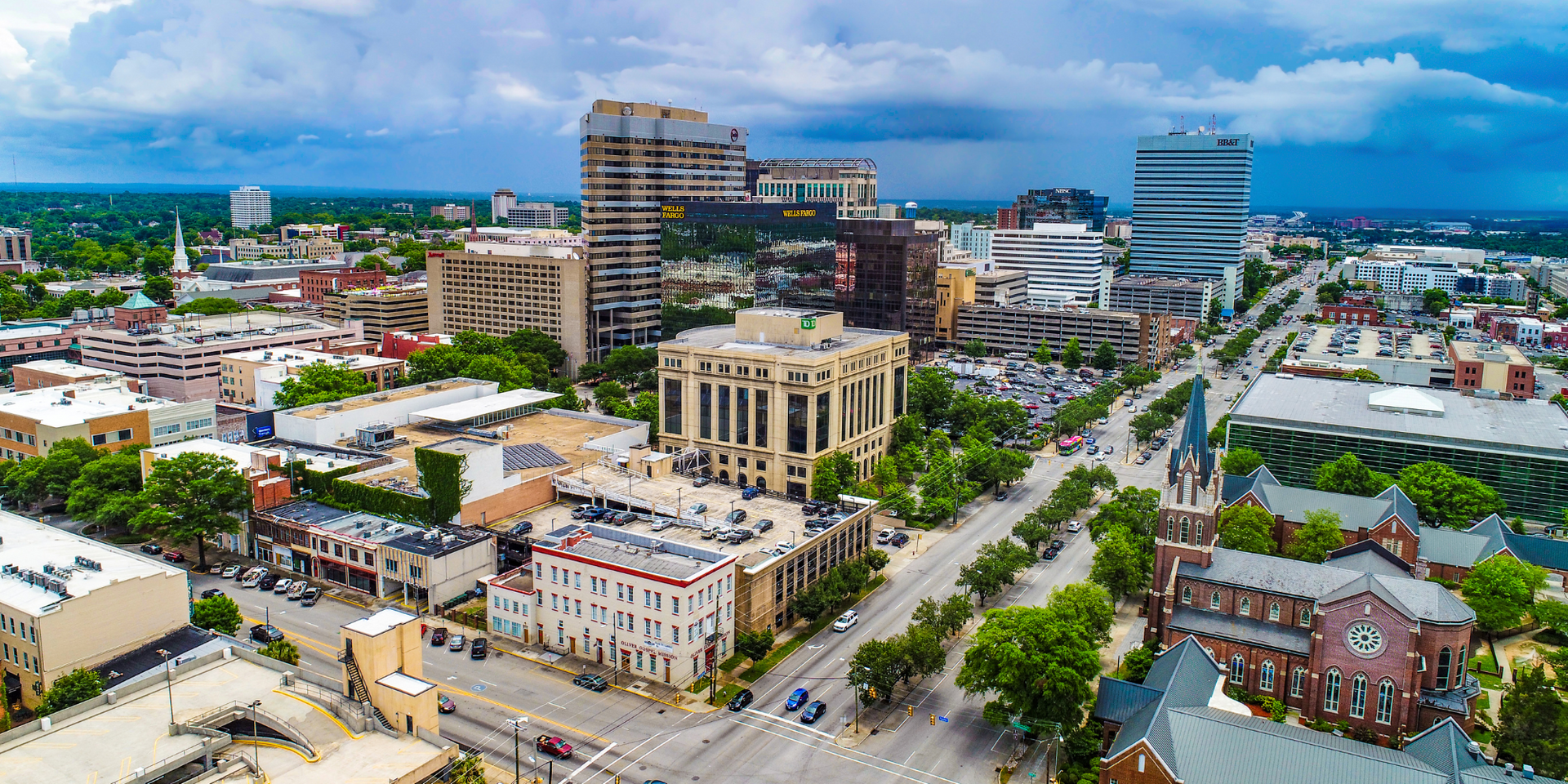 Aerial view of downtown Aiken, South Carolina showing office buildings, historic churches