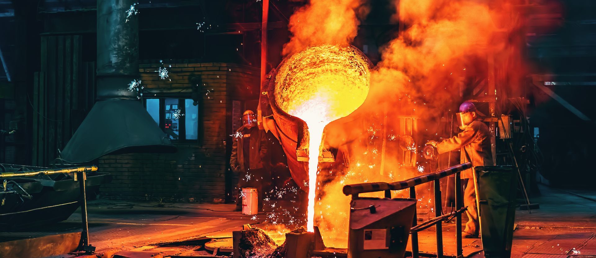 Liquid iron molten metal pouring in container, industrial metallurgical factory. Liquid iron molten metal pouring in container, industrial metallurgical factory.