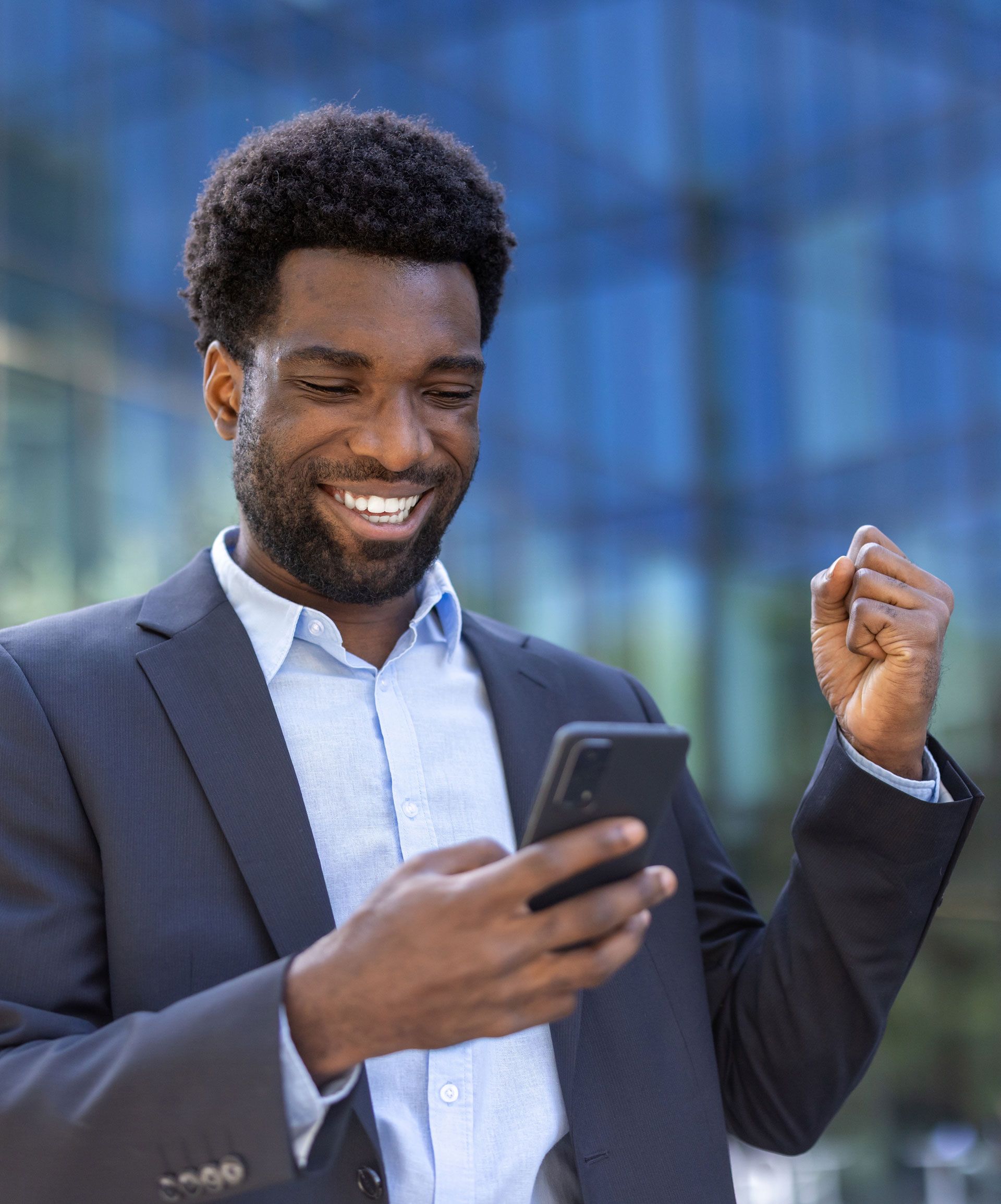 happy man checking his credit progress on the Paramount Credit Pathway app