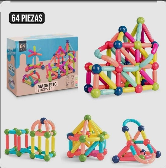Juego de construcción magnético en caja con palitos y esferas de colores, además de estructuras de ejemplo.