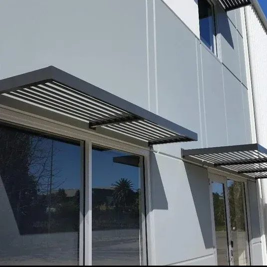 A building with a canopy on the side of it