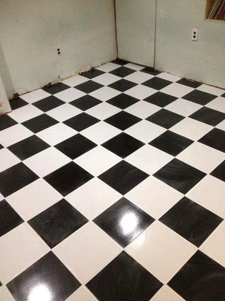A black and white checkered floor in a room
