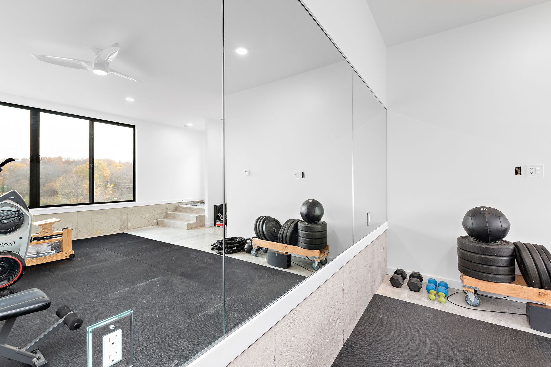 There is a large mirror in the middle of the room.