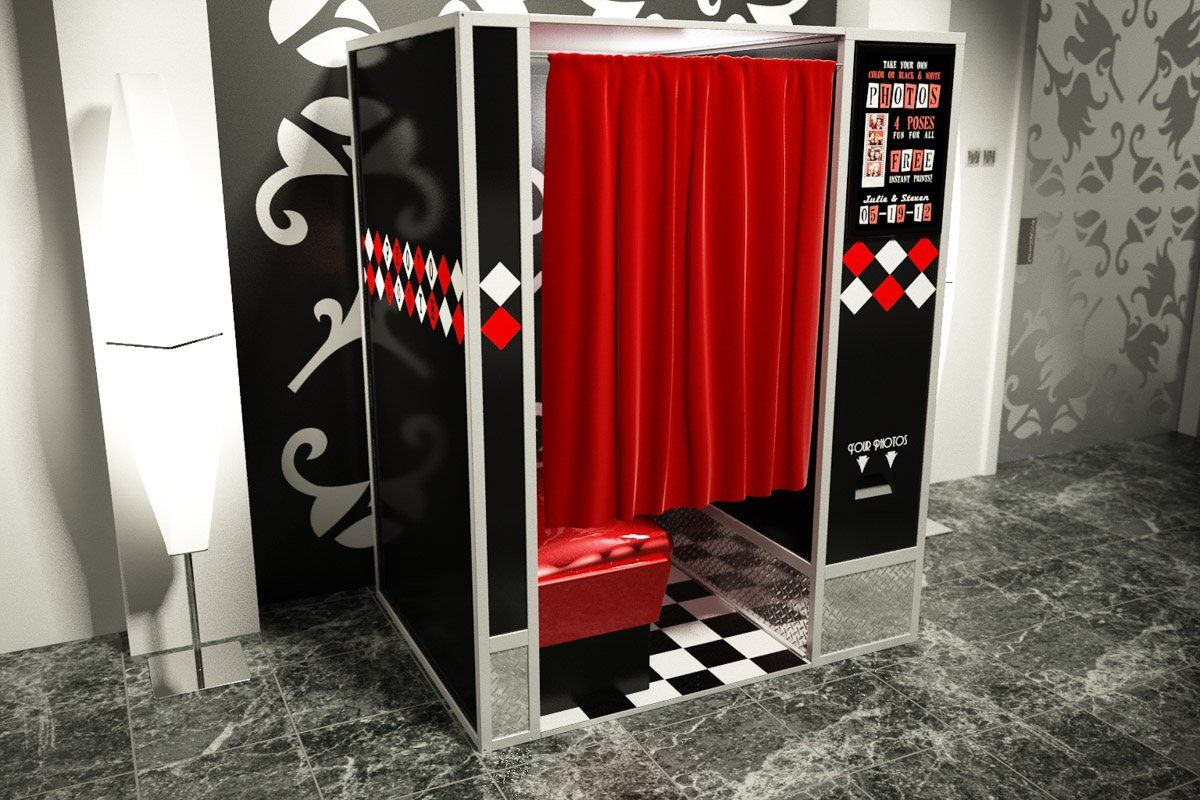 Photo booth with red curtain and black and white details.
