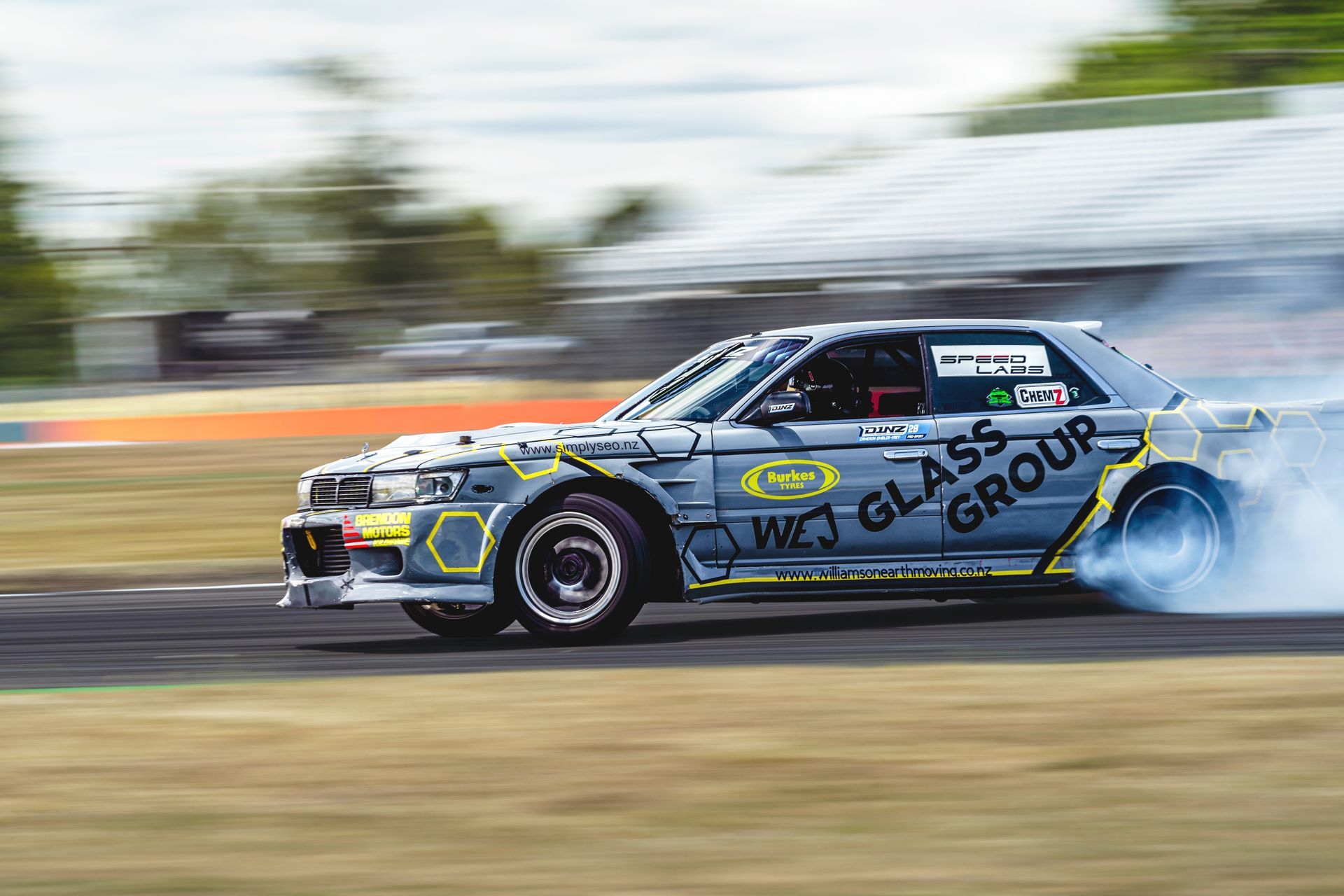 CamGoDrift drifting on a race track.