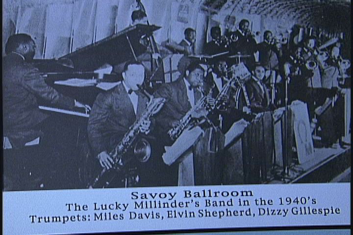 A black and white photo of a band in the savoy ballroom