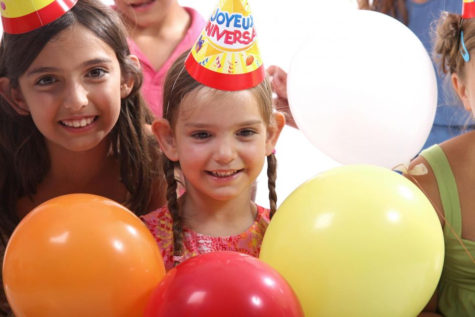 a children with colorful balloons