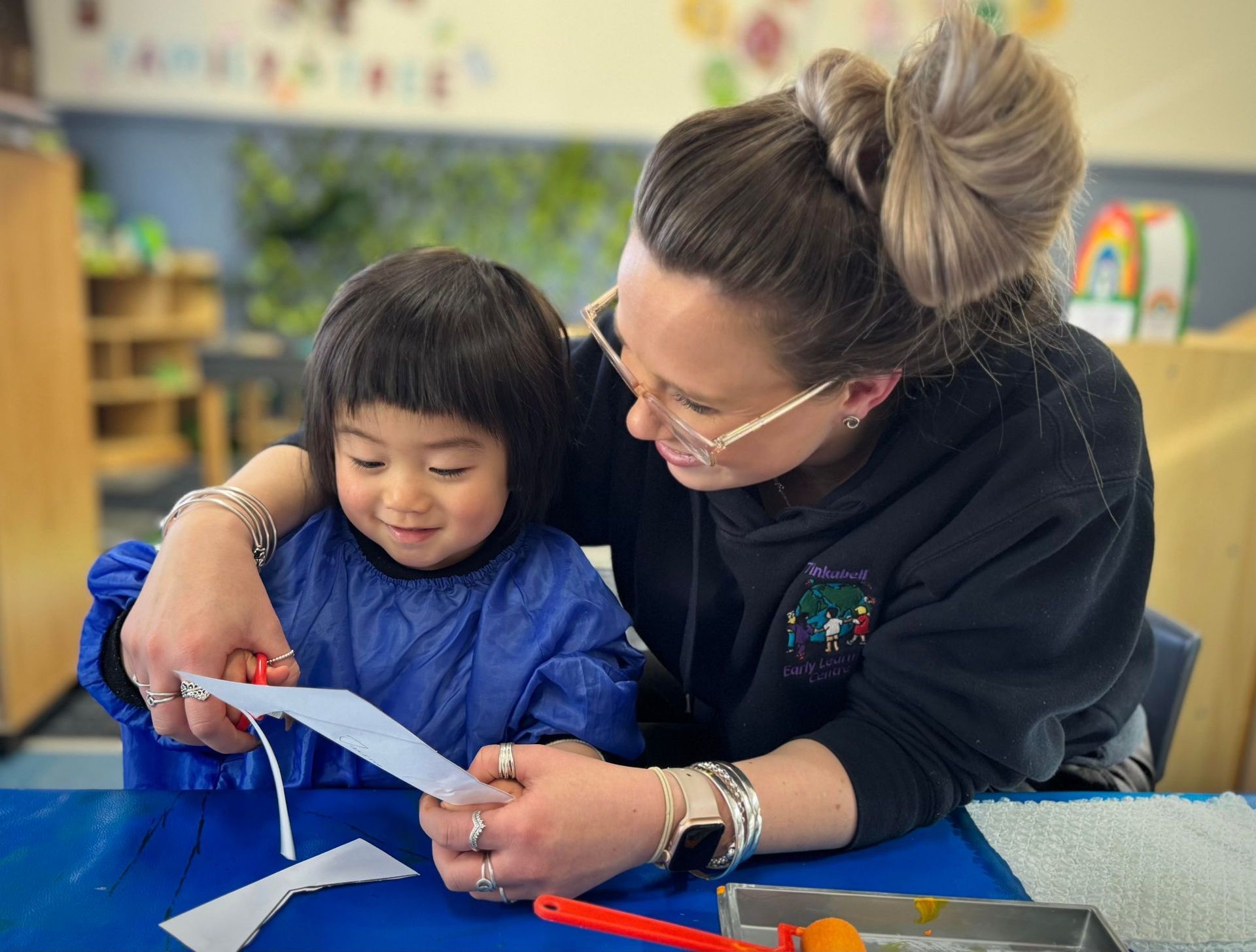 Teacher and child in an early learning centre of the eastern suburbs.
