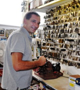 Workman making duplicates of keys - Lock Shop & Key Service in Morrisville, PA