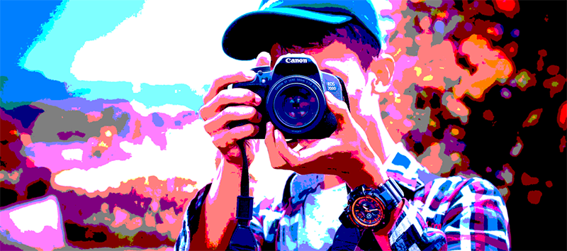 A man is taking a picture with a camera.
